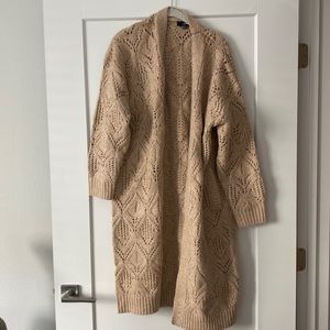 NEW never worn Lulu’s knot sweater with original tags with pockets size M/L